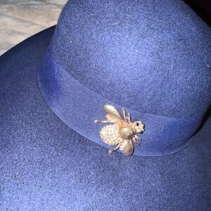 Elegant Blue Hat with Gold Bee Accent